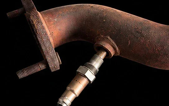 Oxygen sensor spacer installation step removing the sensor from the exhaust pipe